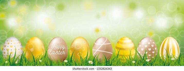 Golden painted easter eggs in the green grass.  Eps 10 vector file. 