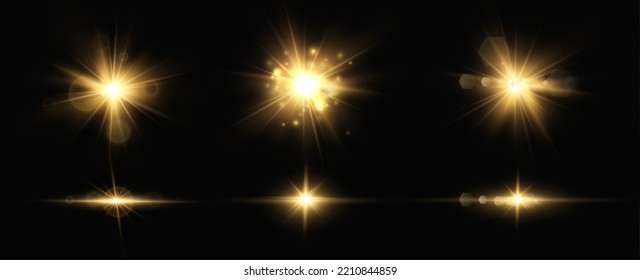 Golden particles of light. Golden light. Light flare.Stars isolated on transparent background.