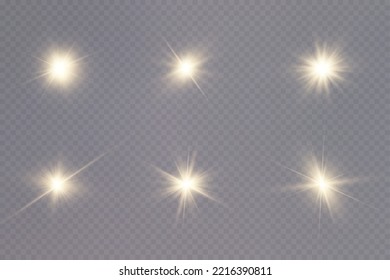 Partículas doradas de luz. Luz dorada. Lámpara de luz.Estrellas aisladas en un fondo transparente.