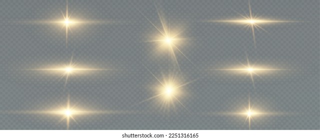 Golden particles of light. Golden light. Light flare.Stars isolated on transparent background.