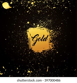 Golden particles of the precious metal on a dark background