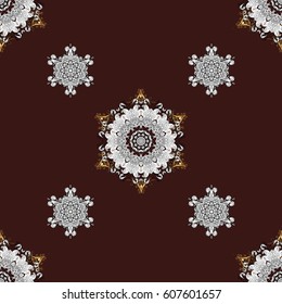 Golden pattern on brown background with golden elements. Seamless vintage pattern on brown background with golden elements. Christmas, snowflake, new year.