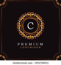 Golden Premium Luxury Mandala Badge Letter C Logo Design. Elegance Ornate Decoration Madala Badge On Gold Frame  . 