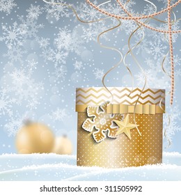 golden present in snowdrift, christmas motive, vector illustration, eps 10 with transparency and gradient mesh