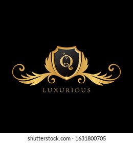Golden Q Logo  Luxurious  Shield vector design concept.