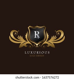 Golden  R Logo Luxurious Shield, creative vector design concept for luxury business indentity.