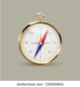 Golden realistic compass isolated on gray background. Vector design element.