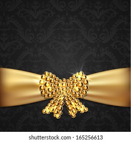 Golden ribbon with diamond bow decoration on ornate background -  eps10 vector illustration