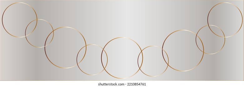 golden rings decoration on a silvery background
