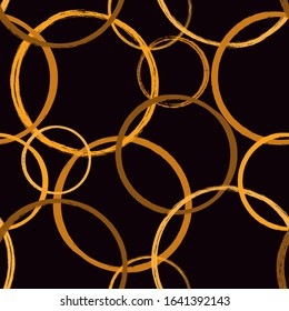 Golden rings seamless pattern. Repeated chaotic bubbles, circles motif. Geometric surface print. Freehand brush design texture. Luxury style vector abstract background