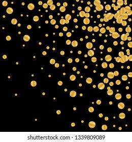 Golden round falling confetti. Festive gold foil on black background.