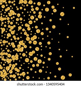 Golden round falling confetti. Festive gold foil on black background.