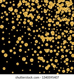 Golden round falling confetti. Festive gold foil on black background.