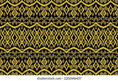 Patrones dorados de ikat reales sobre fondo negro. Estilo retro de la cosecha tribal geométrica. El tejido étnico da lugar a un patrón sin fisuras. Vector de impresión kat navajo aztec indio. Diseño para texturas de fondo.