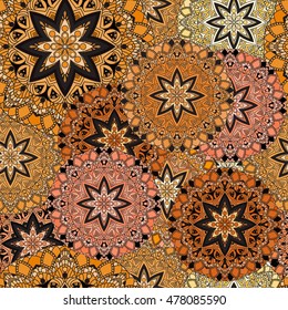 Golden seamless design in oriental style. Stellar mandalas background for card, front-side, cover or wrapping paper. Indian, arabic, chinese, turkish lace print