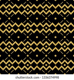 Golden seamless glittering zigzag pattern on black background. Repeatable geometric design. Can be used for fabric, wallpaper, web background, greeting card, scrap booking, vector
