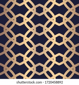 Golden seamless pattern in art deco style. Figure from a rhombus on a blue background, textile, print, wallpaper