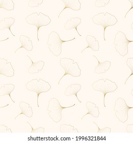 Golden seamless pattern with ginkgo biloba leaves. Vector isolated background with fallen leaf outlines. Gold texture for textile or wrapping paper.