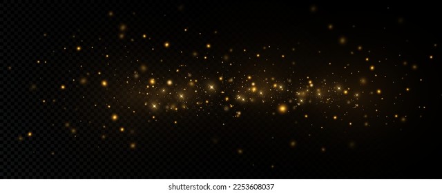 Golden sequins glow with many lights. Glittering dust. Luxurious background of golden particles.
