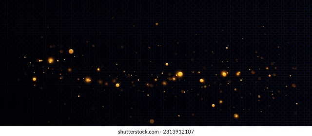 Golden sequins glow with many lights. Glittering dust. Luxurious background of golden particles.