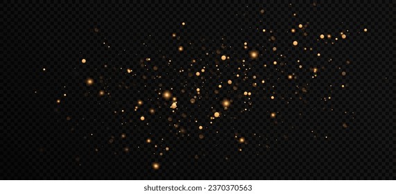 Golden sequins glow with many lights. Glittering dust. Luxurious background of golden particles.