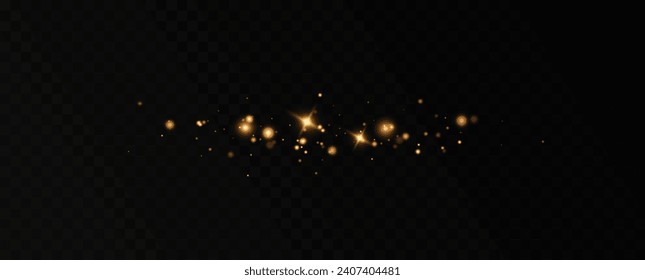 Golden sequins glow with many lights. Glittering dust. Luxurious background of golden particles.	