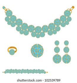 golden set from necklace ring earrings brooch and bracelet with blue stones on white background