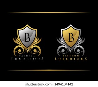 Golden Shield B Letter Logo. Gold Vintage Shield With B Letter prefect for boutique, hotel, restaurant, wedding and other elegant business. 