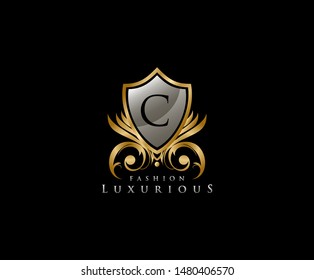 Golden Shield C Letter Logo. Vintage Shield With C Letter prefect for boutique, hotel, restaurant, wedding and other elegant business. 