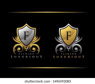 Golden Shield F Letter Logo. Gold Vintage Shield With F Letter prefect for boutique, hotel, restaurant, wedding and other elegant business. 