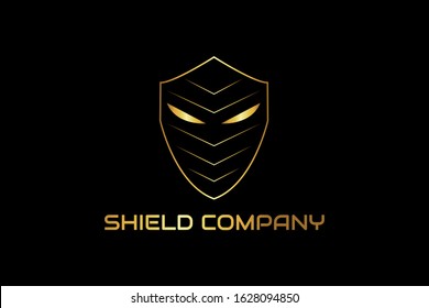 Golden shield logo for a company whose activities in the field of guardian, security, protected etc.