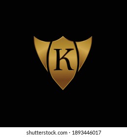 Golden Shield Logo Design for Letter K. Vector Realistic Metallic logo Template Design for Letter K. Golden Metallic Logo. Logo Design for car, safety companies and others.