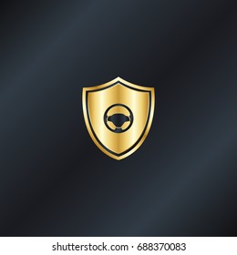 Golden shield with wheel driver icon