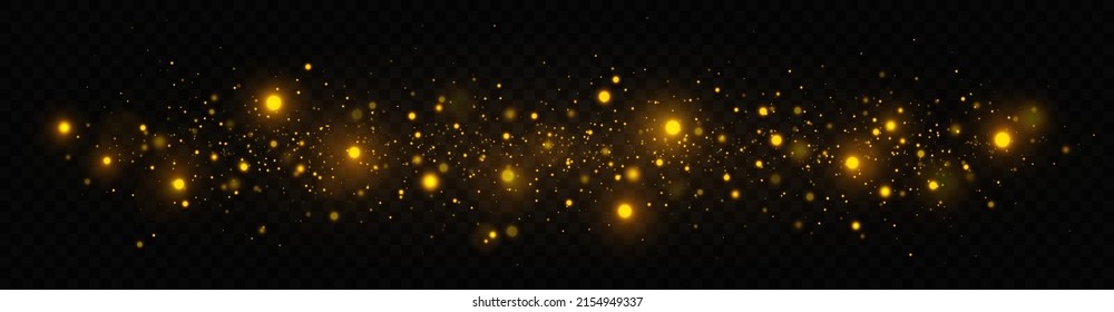 Golden shimmering background with light effect. The dust sparks and golden stars shine with special light on a transparent background. Christmas concept.