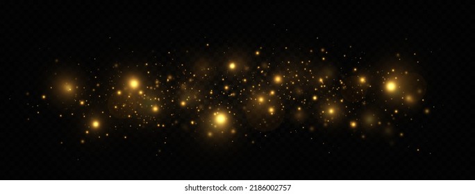 Golden shimmering background with light effect. The dust sparks and golden stars shine with special light on a transparent background. Christmas concept.