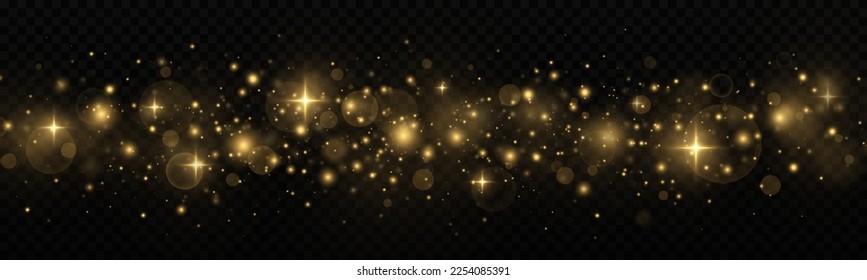 Golden shimmering background with light effect. The dust sparks and golden stars shine with special light. Christmas concept.