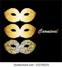 Golden shiny mask on a black background. Carnival.