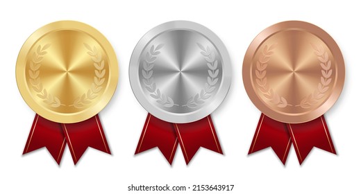 Golden silver and bronze award sport medal with red ribbons