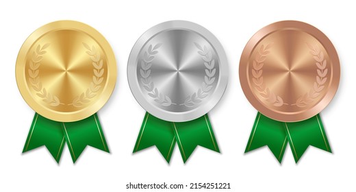 Golden silver and bronze award sport medal with green ribbons