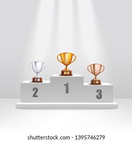 Golden and silver and bronze trophy cups stand on award podium realistic style, vector illustration on white background. First and second and third places winning prizes on ceremony pedestal