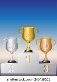 Golden, silver and bronze trophy cups on white podium.