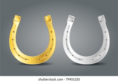 Golden and silver horseshoes. Symbol of luck