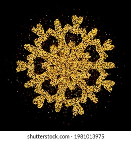 Golden snowflake design with small dust particles on black background