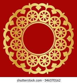 Golden snowflake on red background