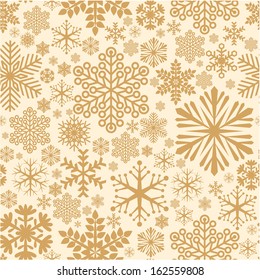 Golden snowflake seamless vector background pattern.