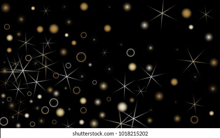 Golden Snowflakes. Christmas Confetti. Festive Background with Yellow and Orange Bokeh and Stars. New Year Background with Gold Glitter made of Snowflakes and Stars. Confetti on Black Backdrop