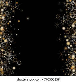 Golden Snowflakes. Christmas Confetti. Festive Background with Yellow and Orange Bokeh and Stars. New Year Background with Gold Glitter made of Snowflakes and Stars. Confetti on Black Backdrop