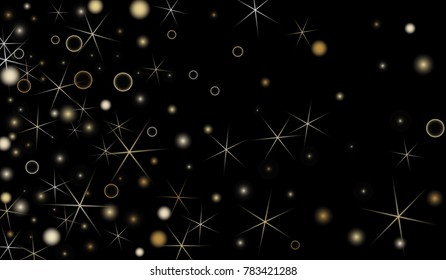 Golden Snowflakes. Christmas Confetti. Festive Background with Yellow and Orange Bokeh and Stars. New Year Background with Gold Glitter made of Snowflakes and Stars. Confetti on Black Backdrop