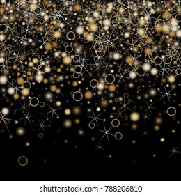 Golden Snowflakes. Christmas Confetti. Festive Background with Yellow and Orange Bokeh and Stars. New Year Background with Gold Glitter made of Snowflakes and Stars. Confetti on Black Backdrop
