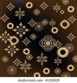 Golden snowflakes on dark background